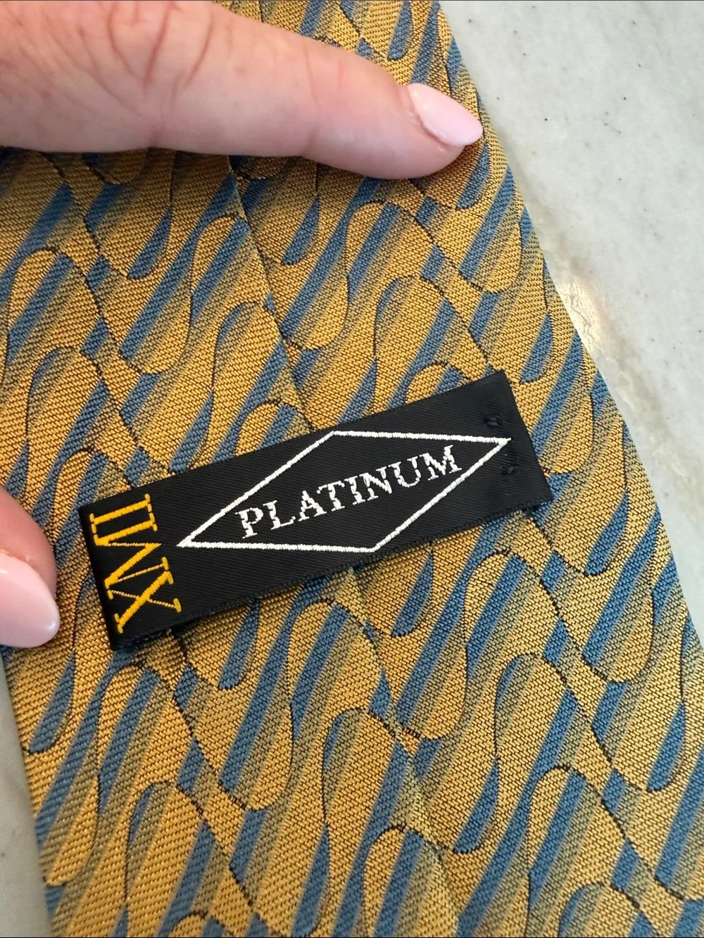 XMI Gold silk Tie with Blue Wave Pattern